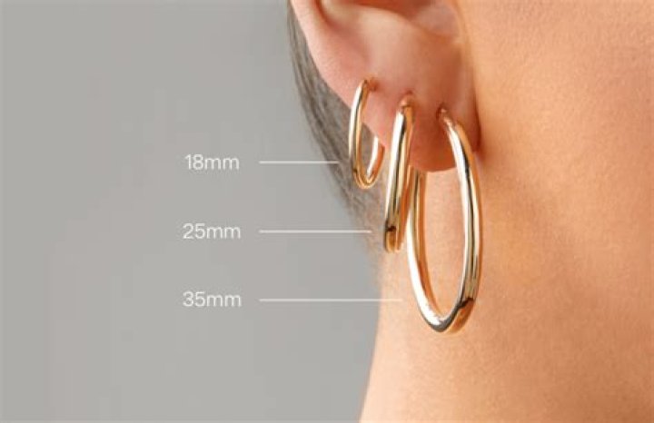 It is an earring that is made with what looks like silver pearls.